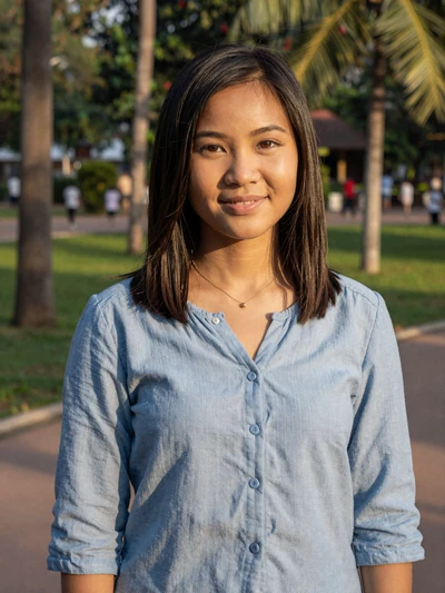 Ketsana Phomma, a 26-year-old Laotian woman from Vientiane smiling in a park - Laotian women dating profile