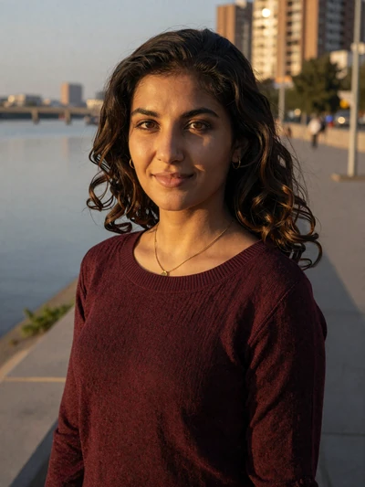 Shahlo Usmanova, a 28-year-old Uzbek woman from Nukus by a river at sunset - Uzbek women dating profile