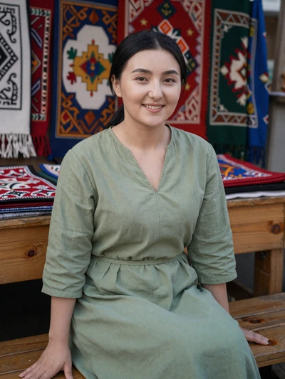 Gulzat Toktogulova, a 25-year-old Kyrgyz woman from Osh at an outdoor market - Kyrgyz women dating profile