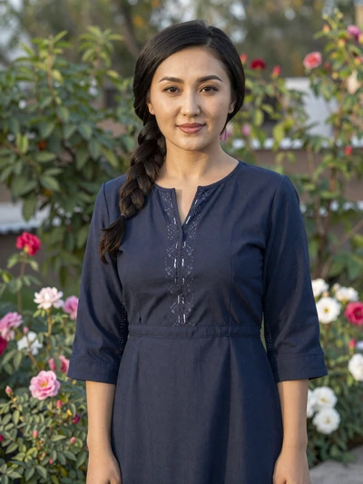 Madina Tulegenova, a 29-year-old Kazakh woman from Shymkent in a flower garden - Kazakh women dating profile