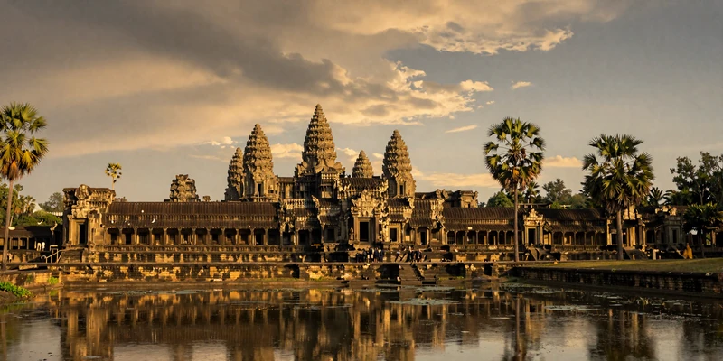 Angkor Wat temple at golden hour reflecting in water - the cultural heritage of Cambodian women on FloridaDatingService