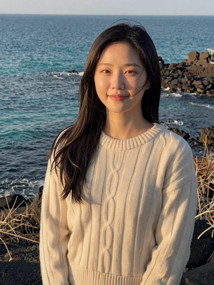 Na-Young Shin, a 28-year-old Korean woman from Jeju Island on a coastal cliff - Korean women dating profile