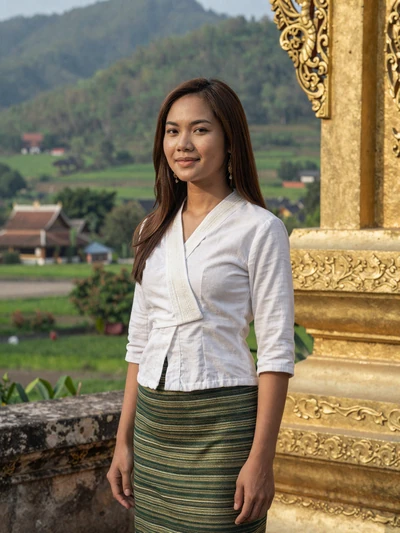 Bounmy Sengchanh, a 28-year-old Laotian woman from Luang Prabang near a golden temple - Laotian women dating profile
