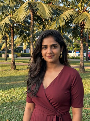 Priya Rajan, a 29-year-old Indian-Malaysian woman from Johor Bahru in a tropical park - Malaysian women dating profile