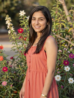 Shirin Rahimi, a 24-year-old Afghan woman from Houston in a flower garden - Afghan women dating profile